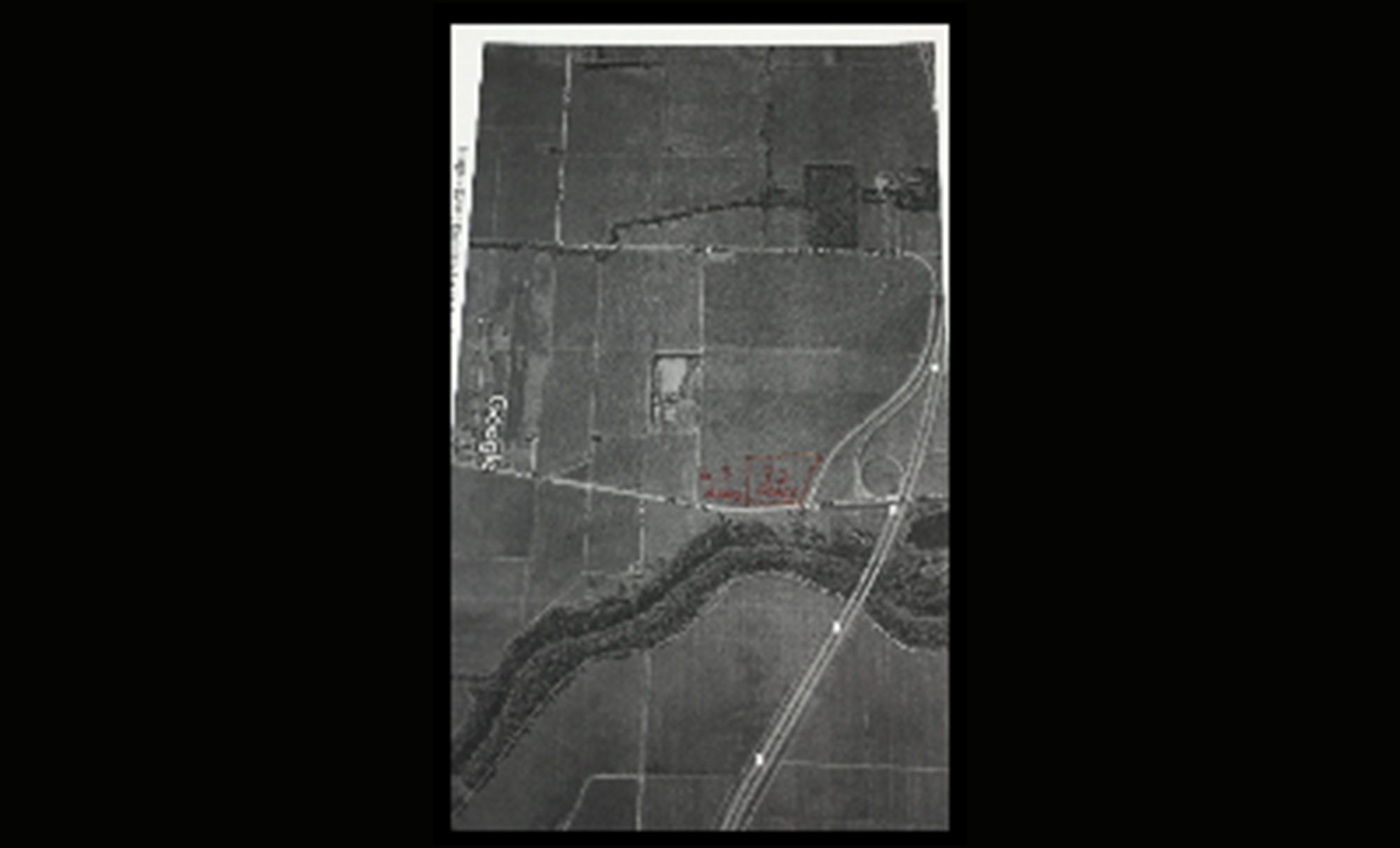 An Antique Monochrome Photograph Capturing a Vast Field